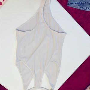 White razorback body suit
